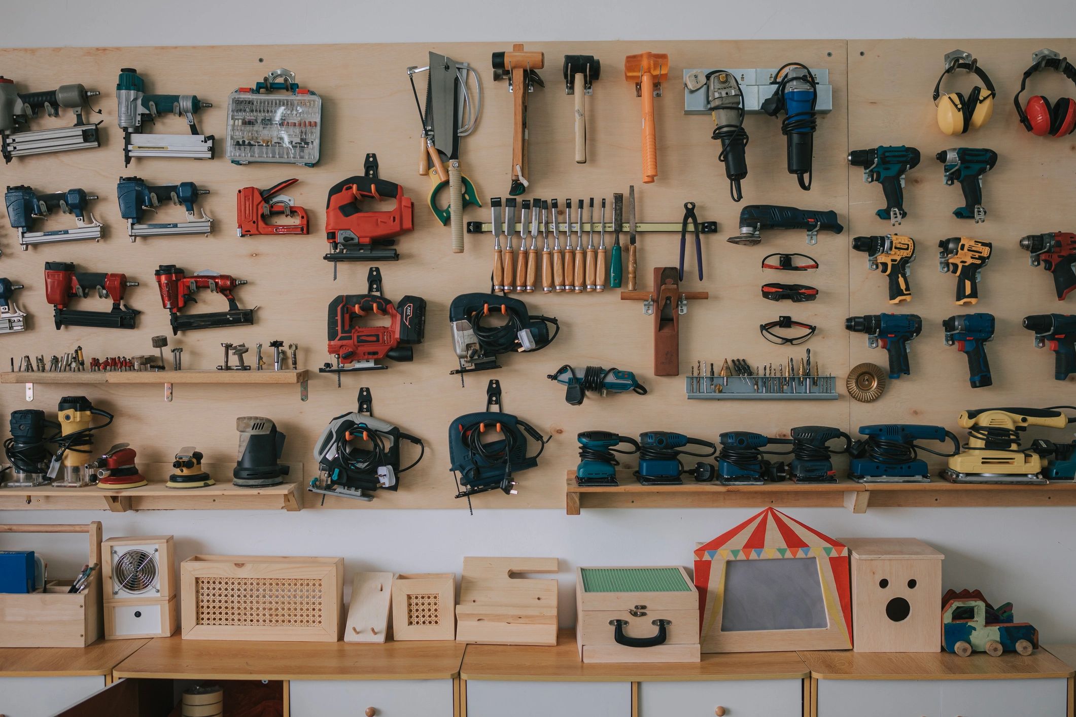 Hand tools laid out on a workbench