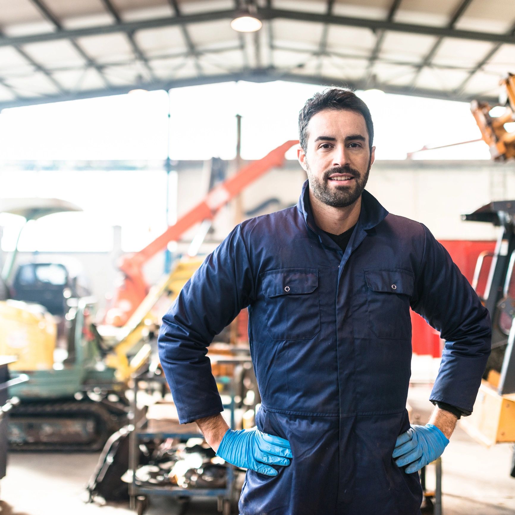 Portrait of a smiling mechanic in a garage